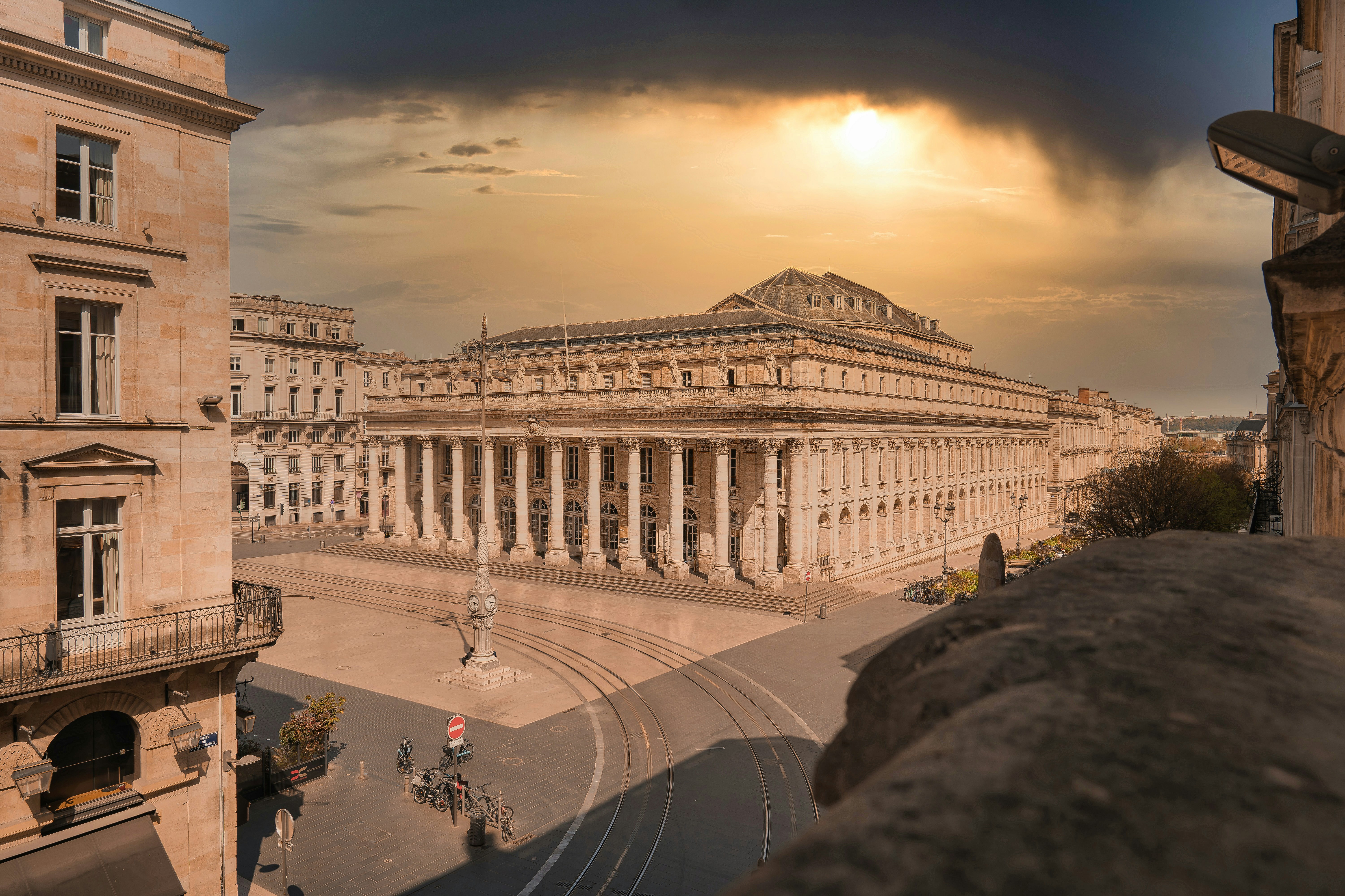 a view of a large building from a balcony