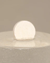 Finished industrial product displayed on a clean white surface with soft lighting.