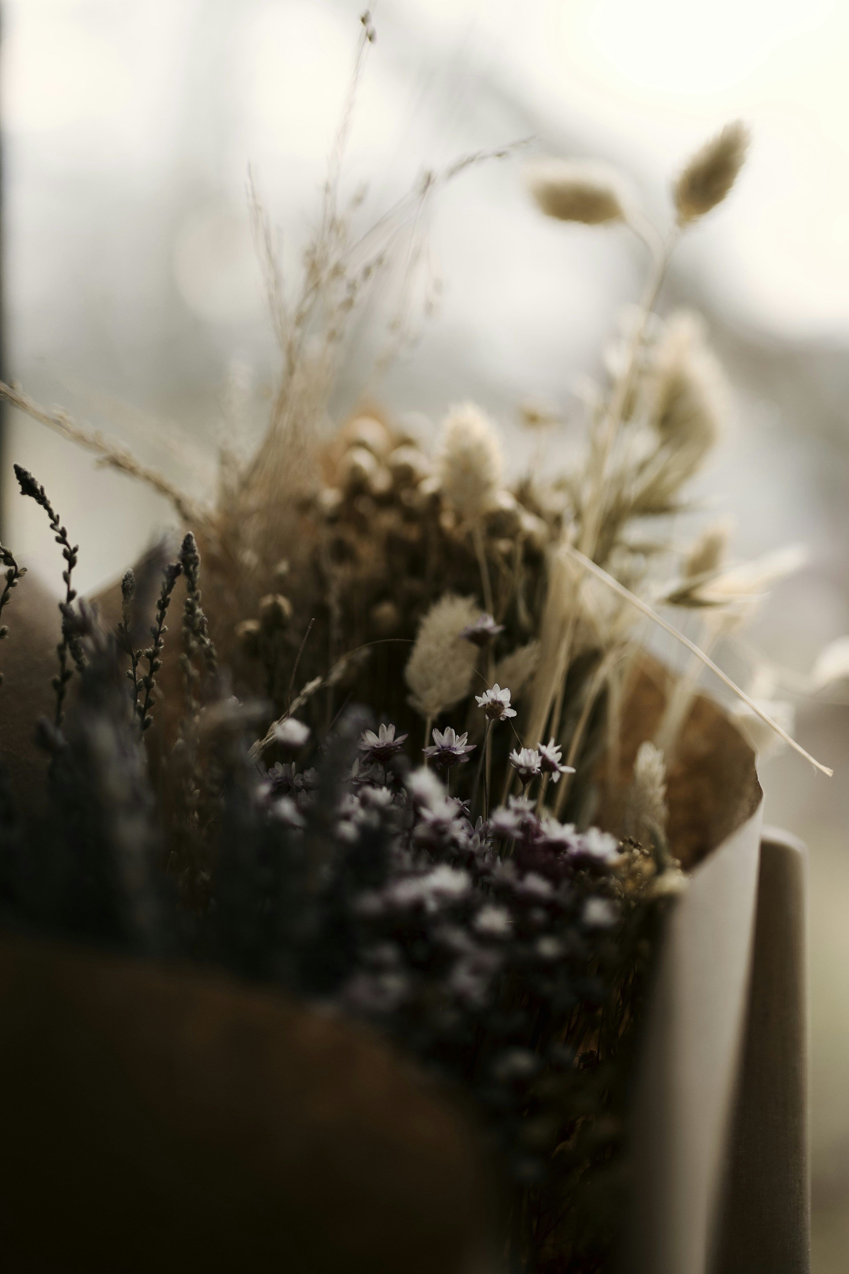 a close up of a bunch of flowers in a vase