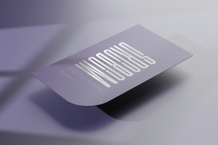 Close-up of a business card on a table for easy customer review requests from Cochrane trades clients