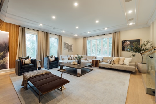 A beautifully designed modern living room with neutral tones and natural textures.