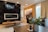 A beautifully mounted TV on a modern living room wall.