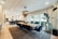 An elegant dining area featuring a modern chandelier from lumecraft.click.