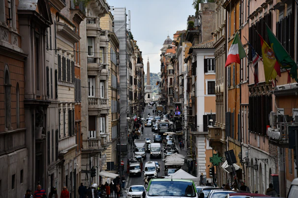 A vibrant street scene in Torino with happy tourists holding city cards near historic landmarks.