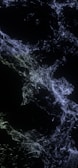 Futuristic mesh of light particles forming a complex neural web