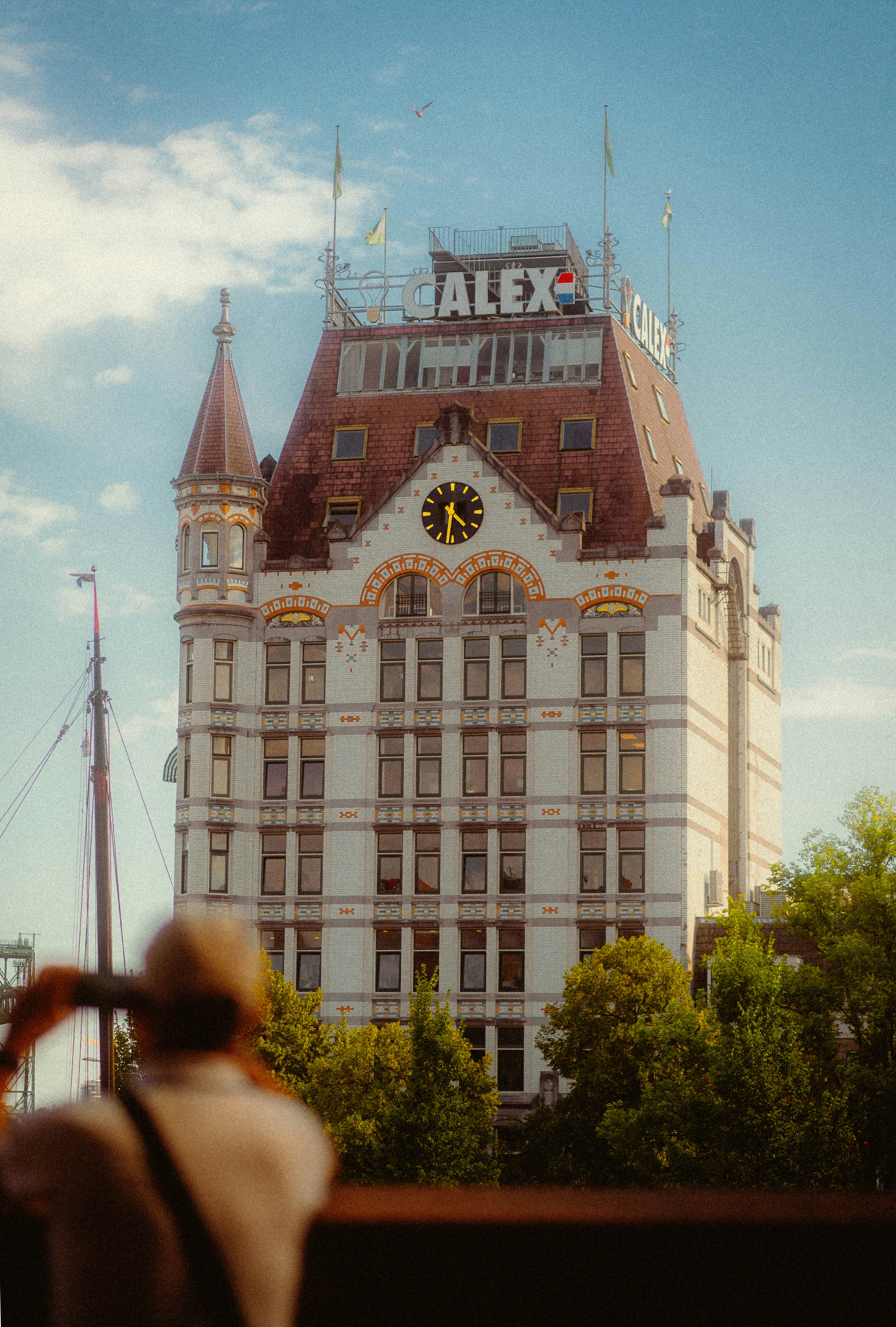 a tall building with a clock on top of it