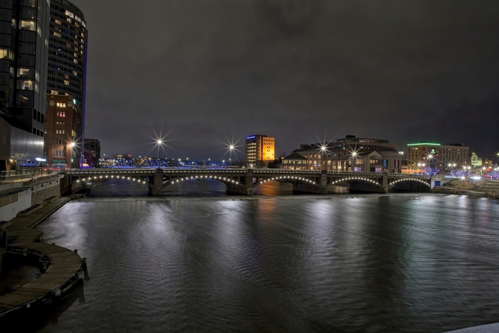 a bridge over a body of water at night