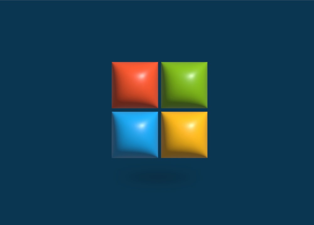 a blue background with four different colored squares