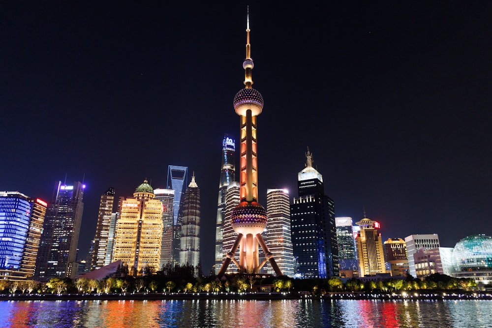 a view of a city at night from across the water