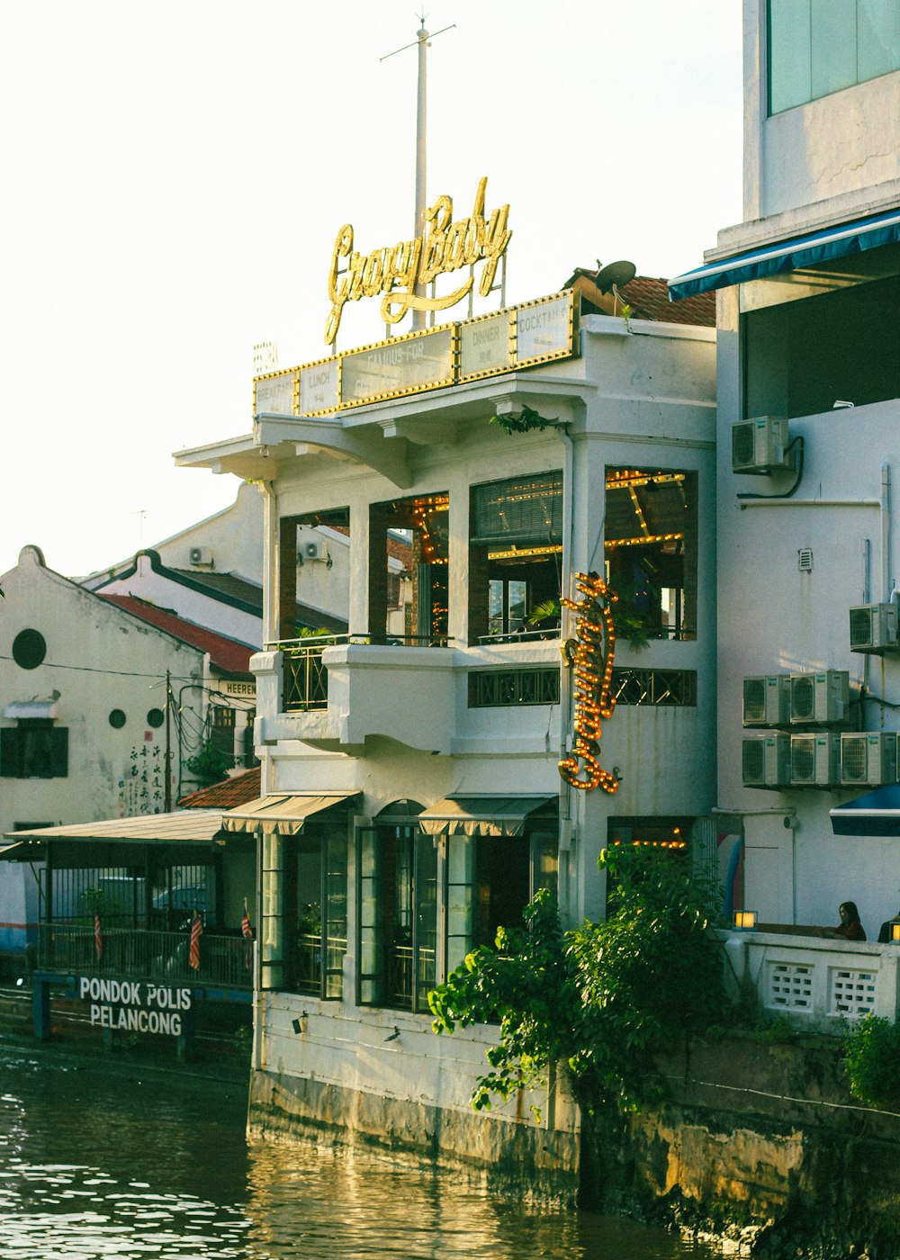 a building on the side of a river