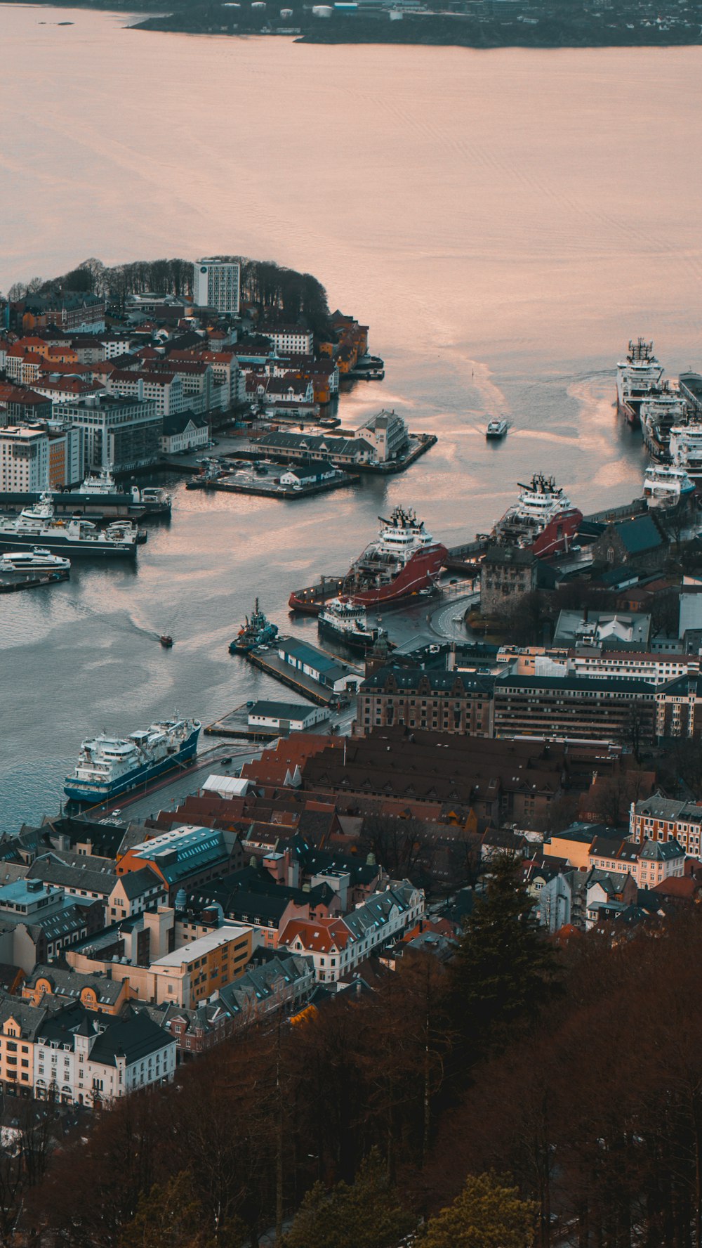 a view of a harbor with boats in the water