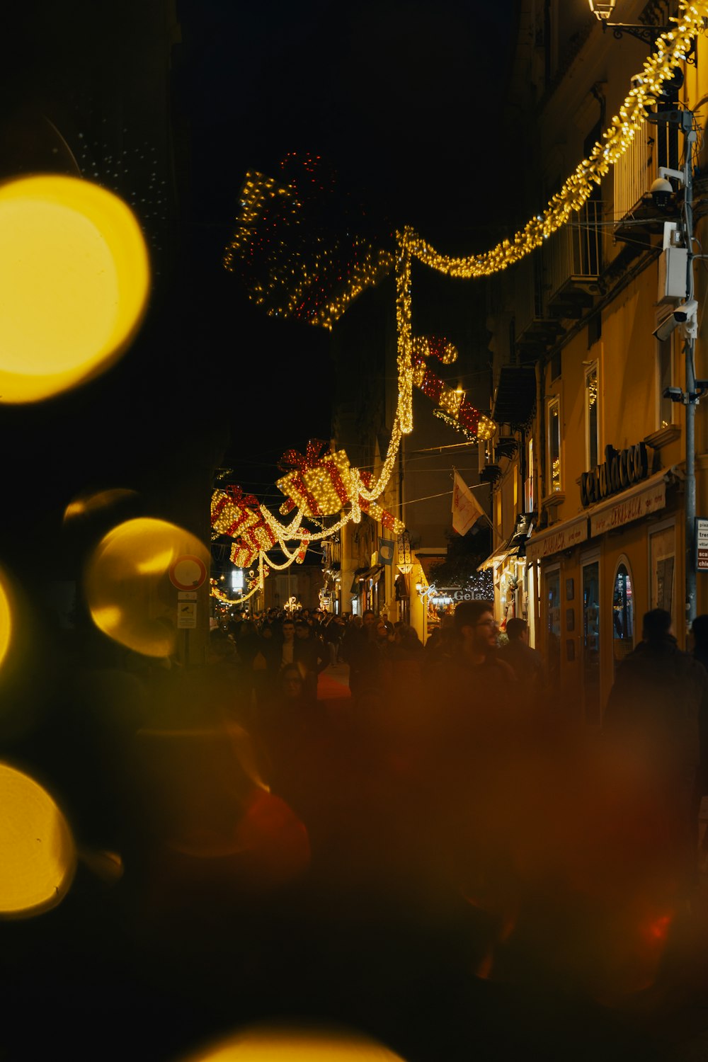 a blurry photo of a city street at night