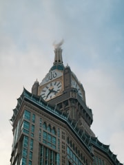 a large building with a clock on the top of it