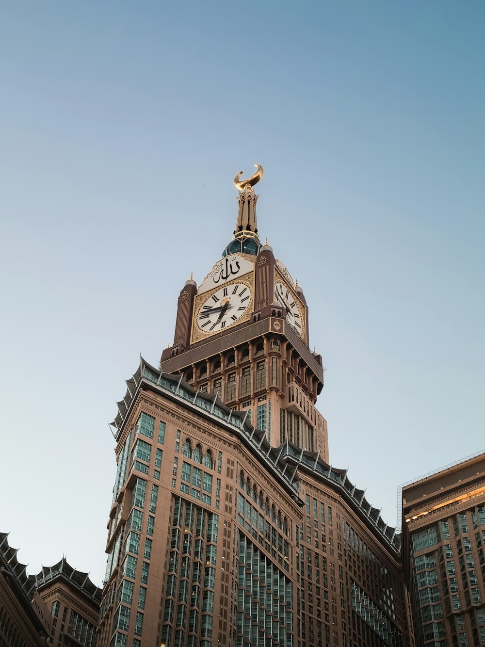 a tall building with a clock on the top of it