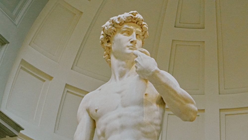 a statue of a man with no shirt on