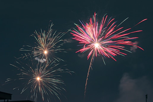 a couple of fireworks that are in the sky