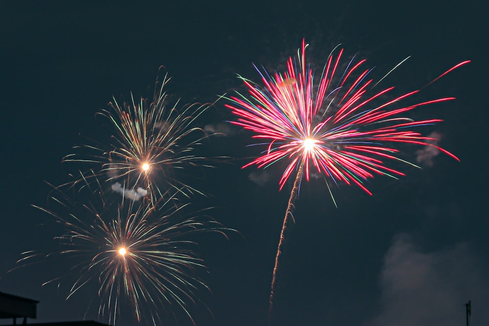 a couple of fireworks that are in the sky