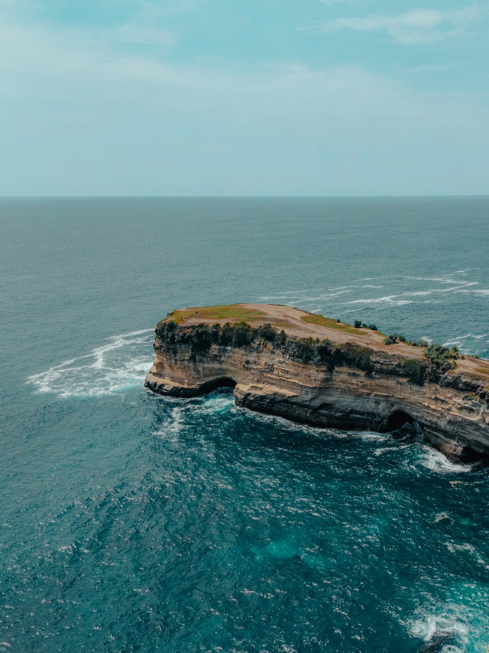 an island in the middle of the ocean