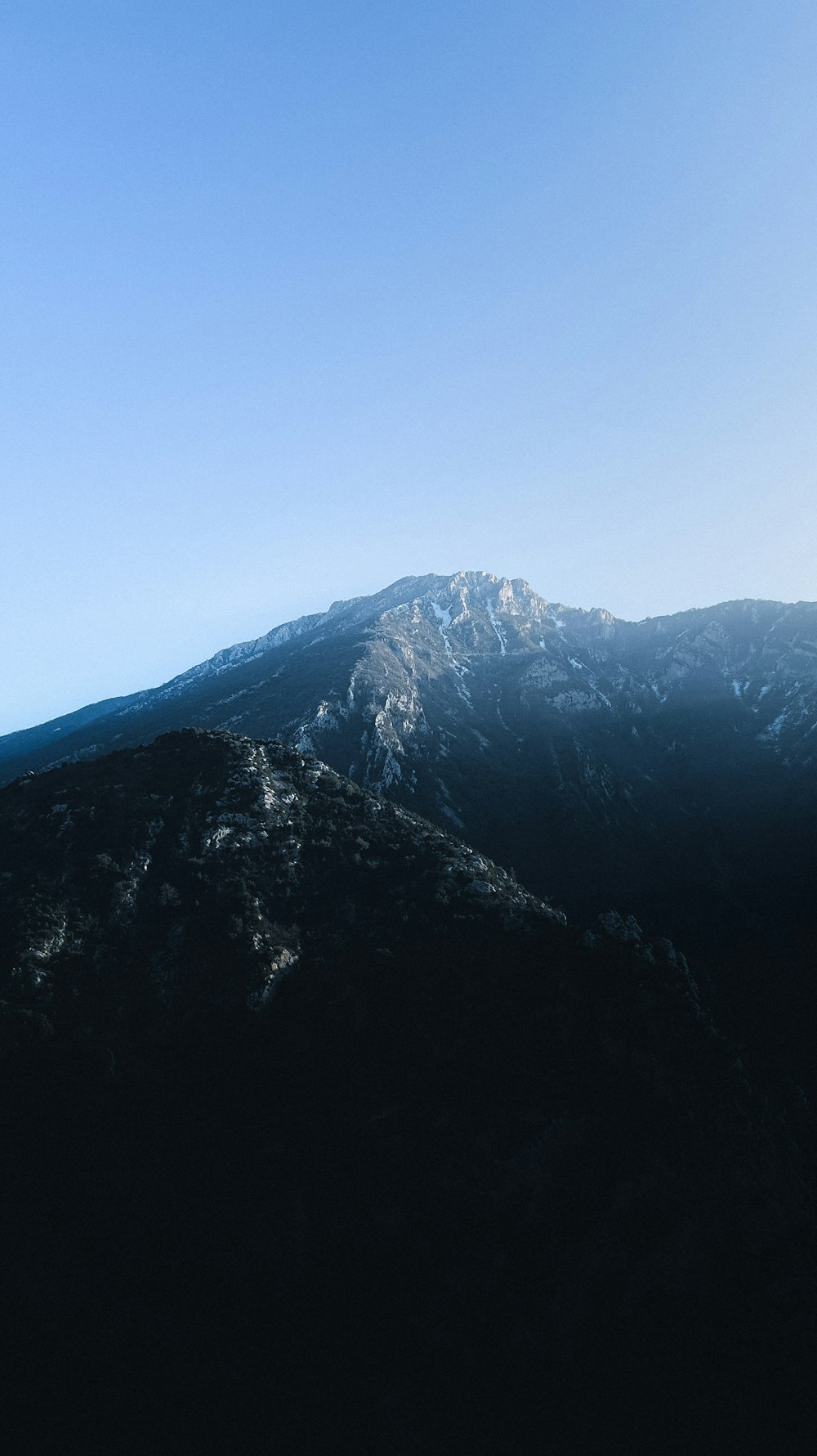 a view of the top of a snowy mountain