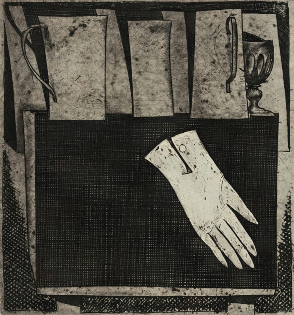 a black and white drawing of a pair of gloves
