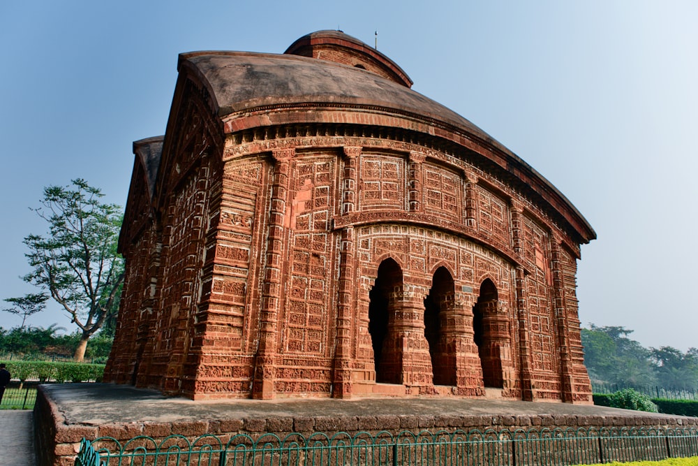 a large brick building with a dome on top of it