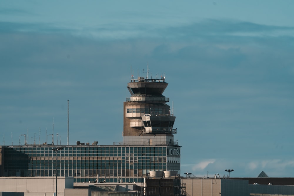 a large air traffic control tower on top of a building