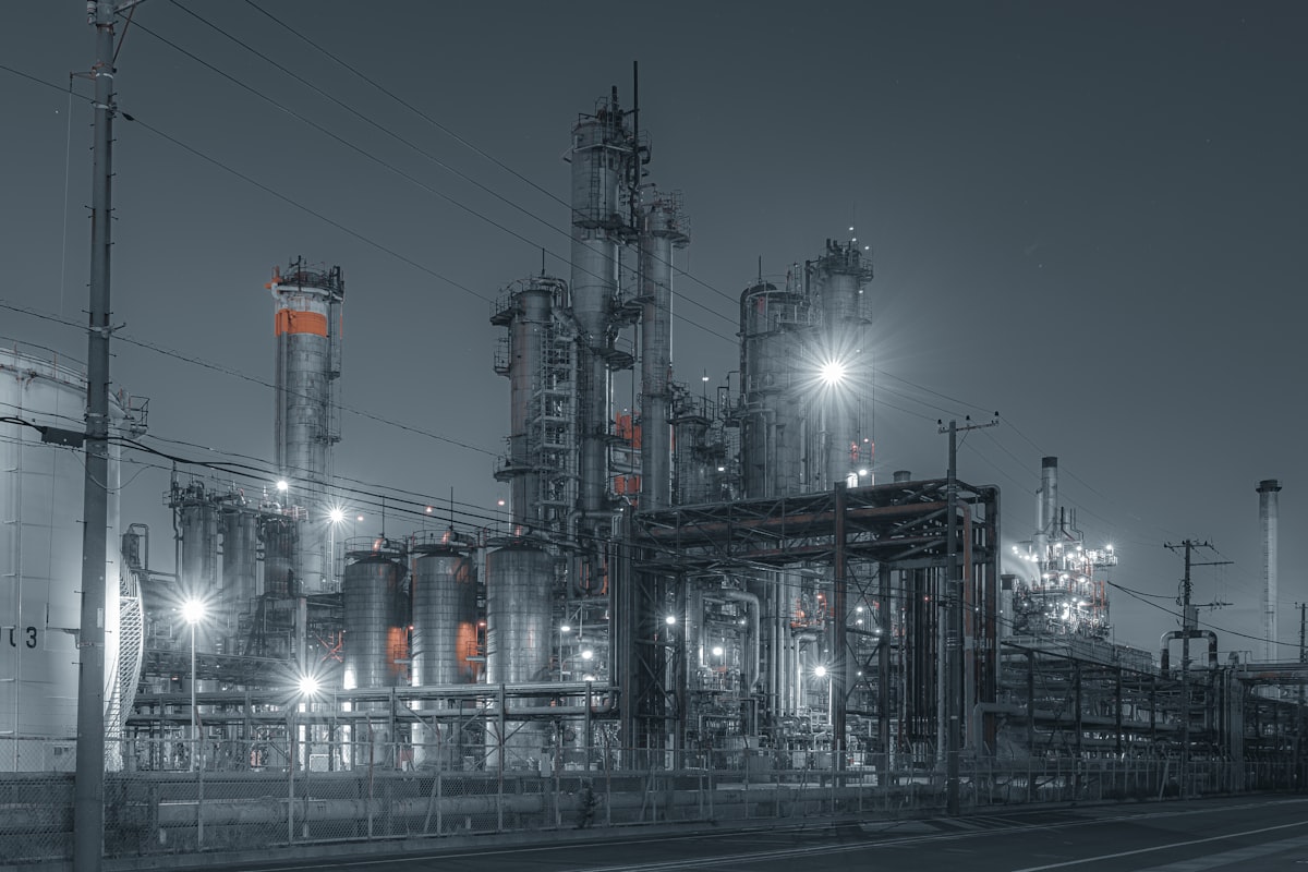 Oil refinery complex illuminated at night