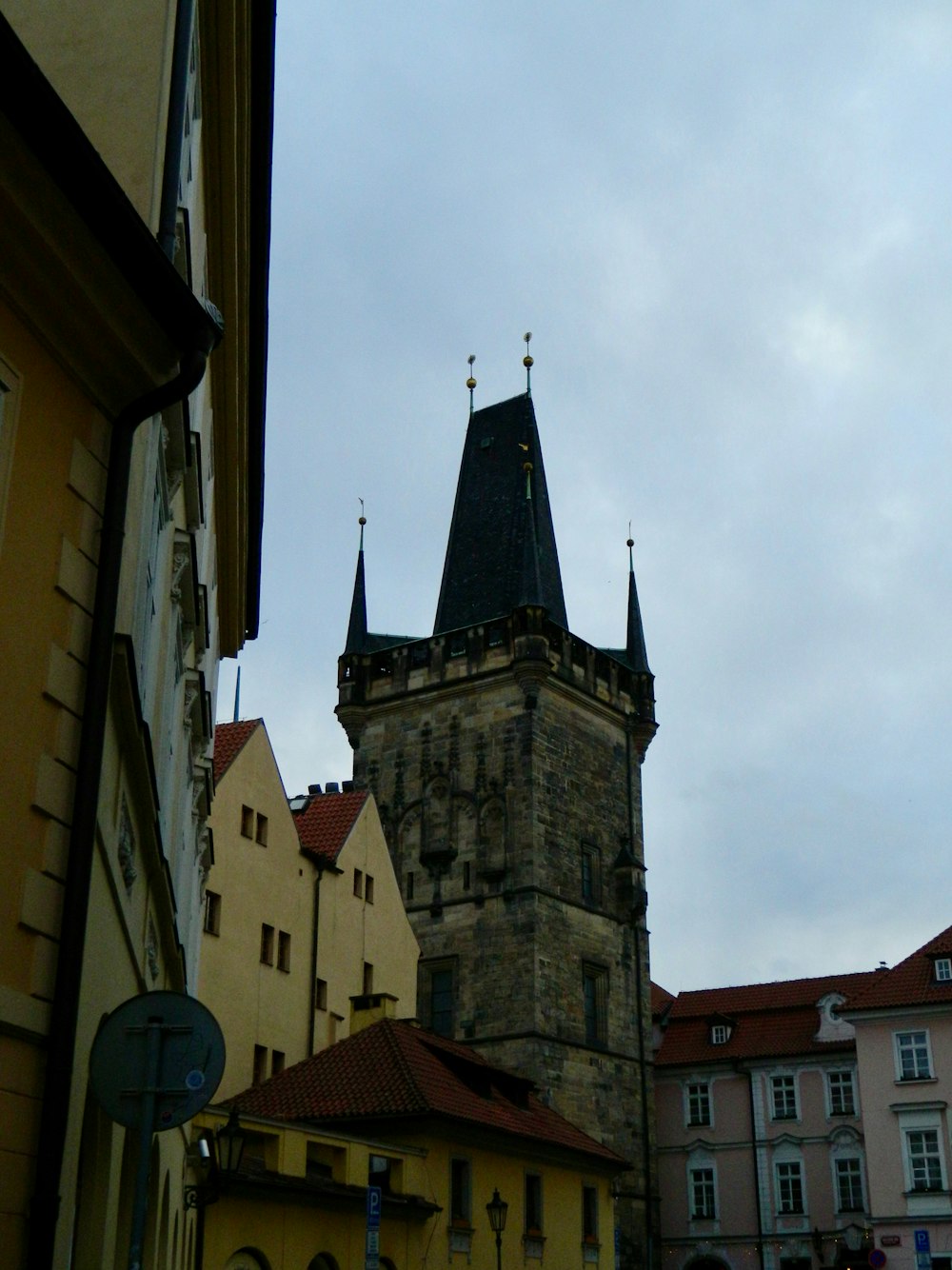 a tall clock tower towering over a city