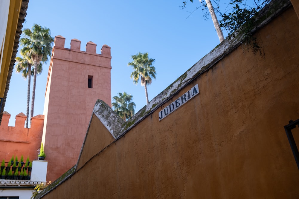 a tall tower with a sign on the side of it