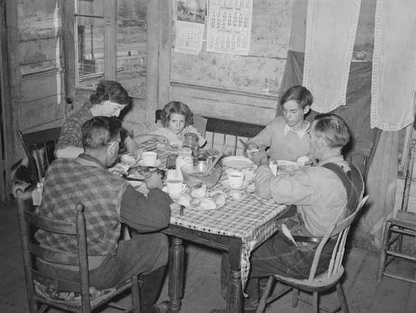 Farm family sharing a meal together