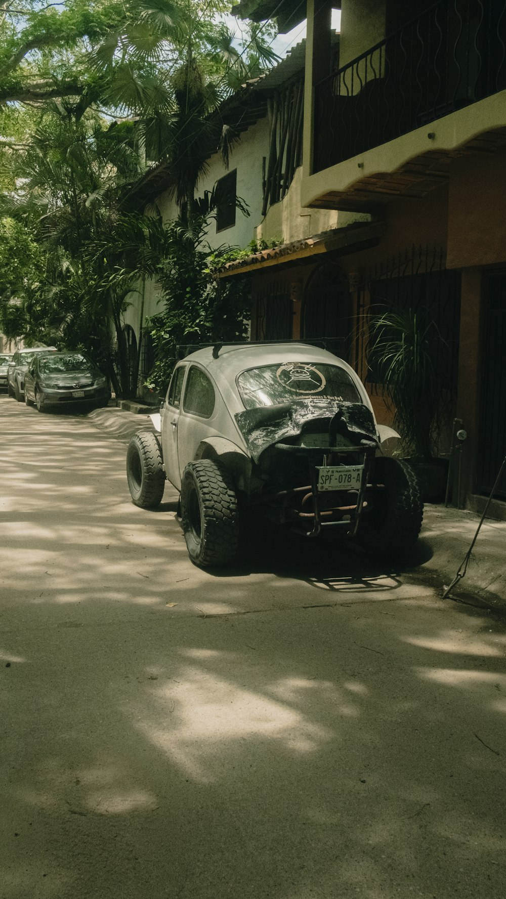 a car parked on the side of a street