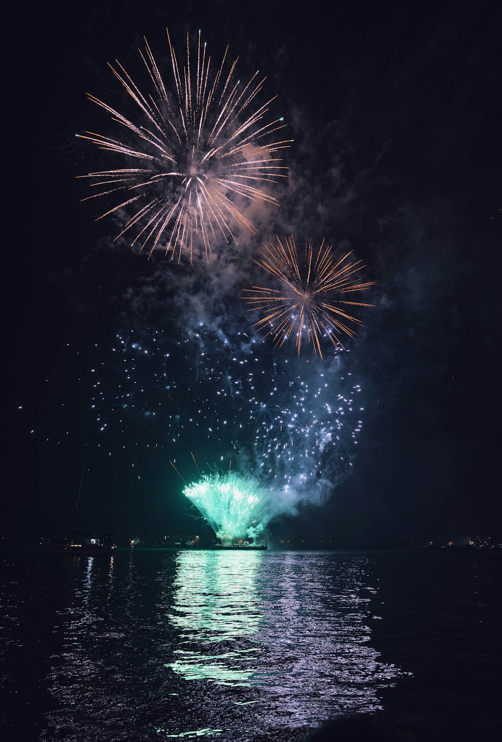 a fireworks display over a body of water