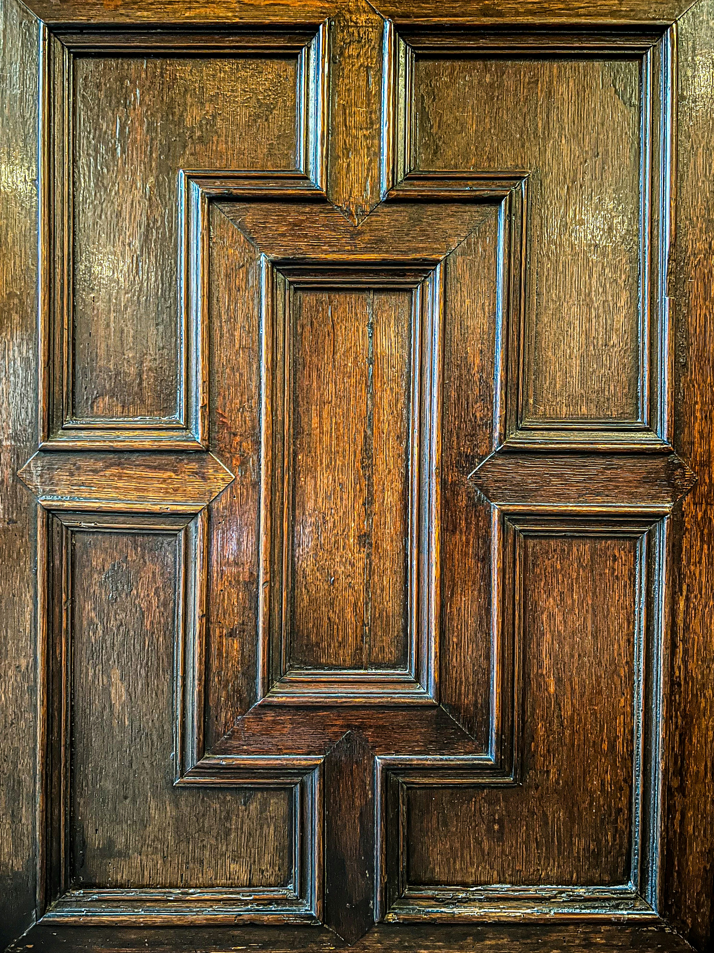 Custom solid timber door with architectural frame, rich dark wood stain, elegant craftsmanship