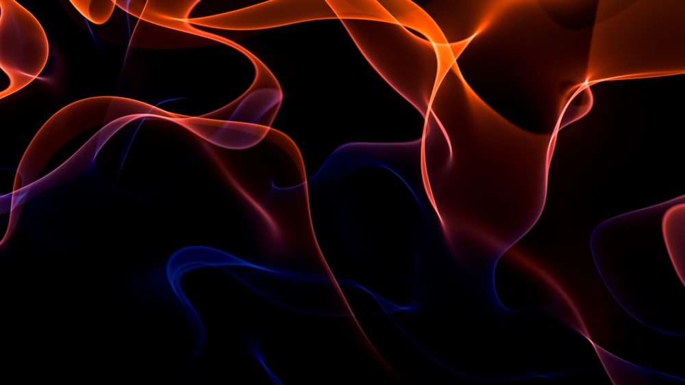 a black background with red and orange smoke