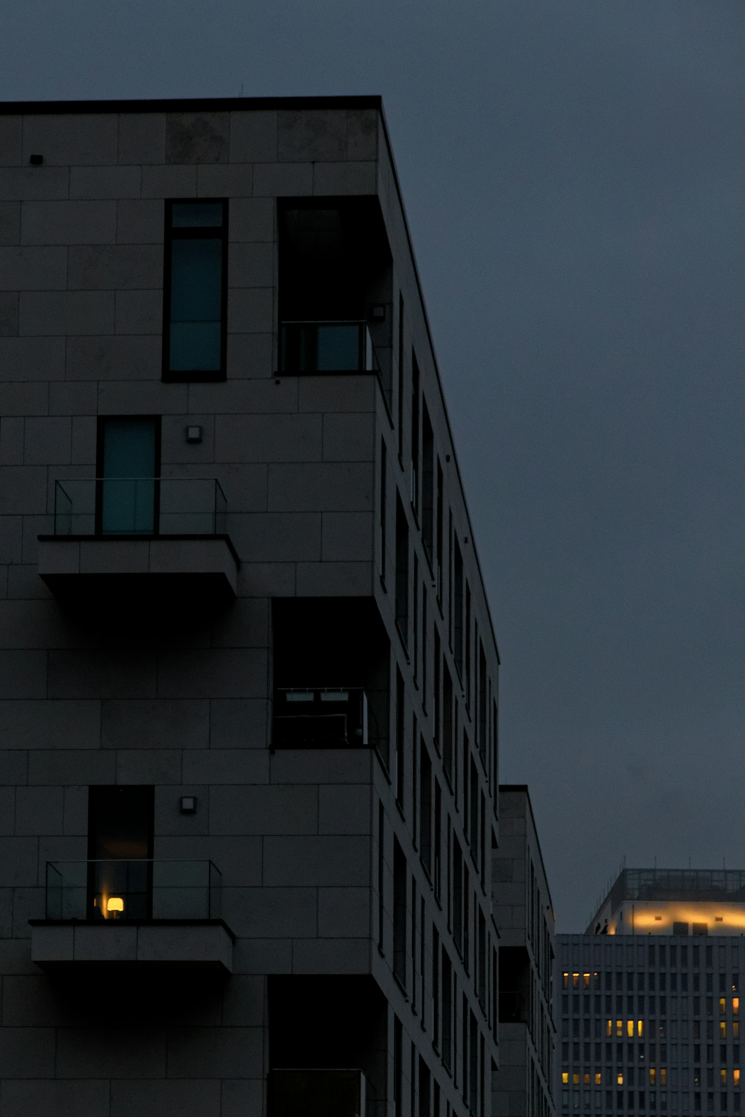a tall building with a clock on the side of it
