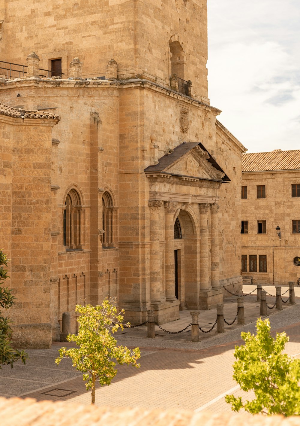 a large stone building with a clock tower