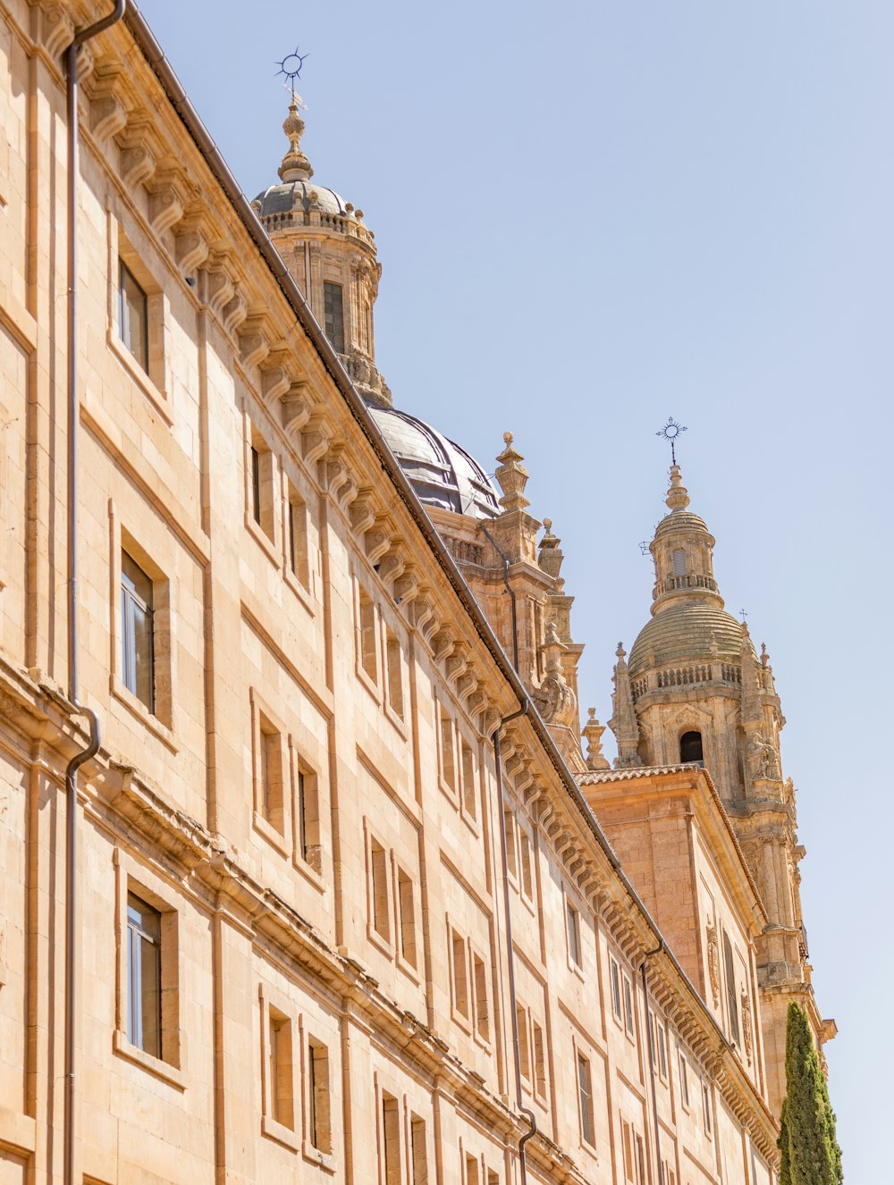 a tall building with a clock on the top of it