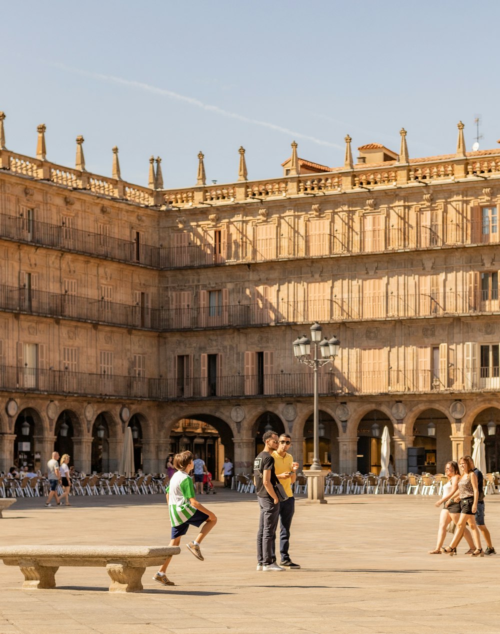 a group of people standing in front of a building