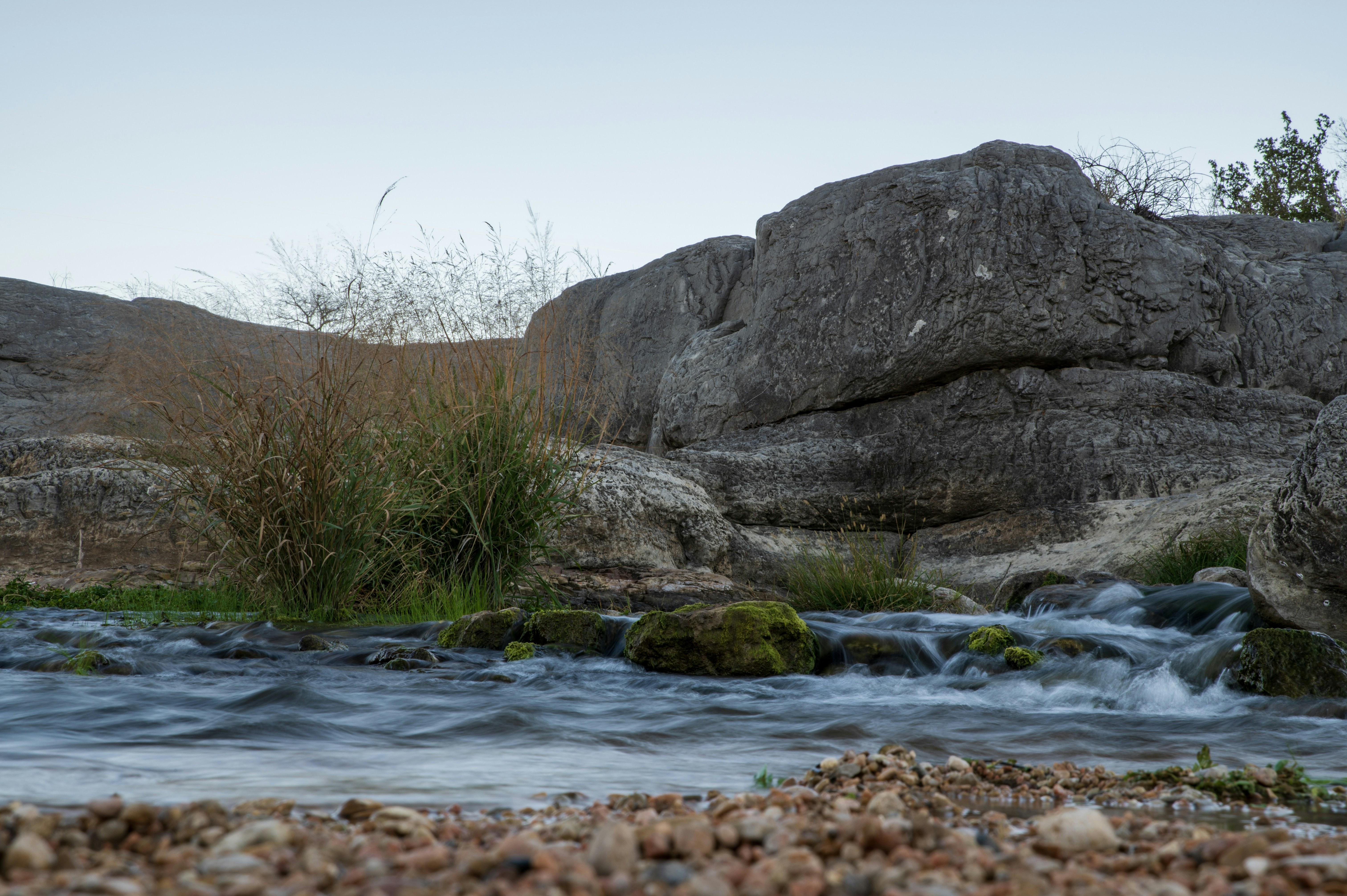 a stream running between two large rocks