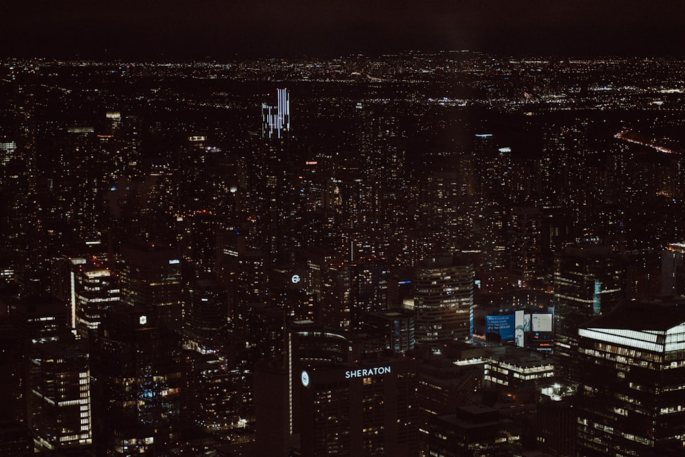 a view of a city at night from the top of a building