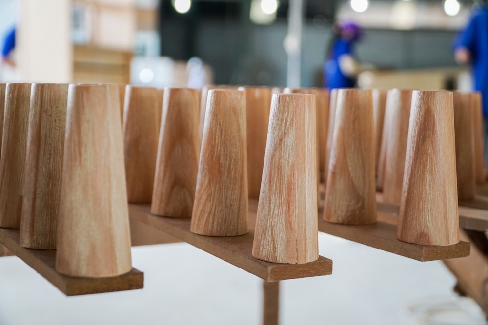 a group of wooden cones sitting on top of a table