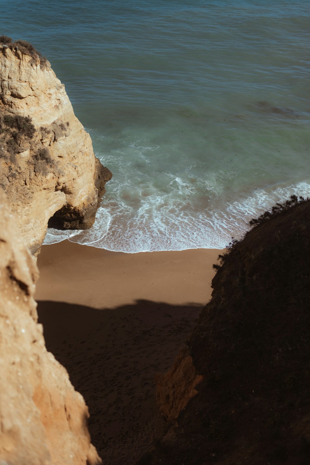 a view of the ocean from a cliff