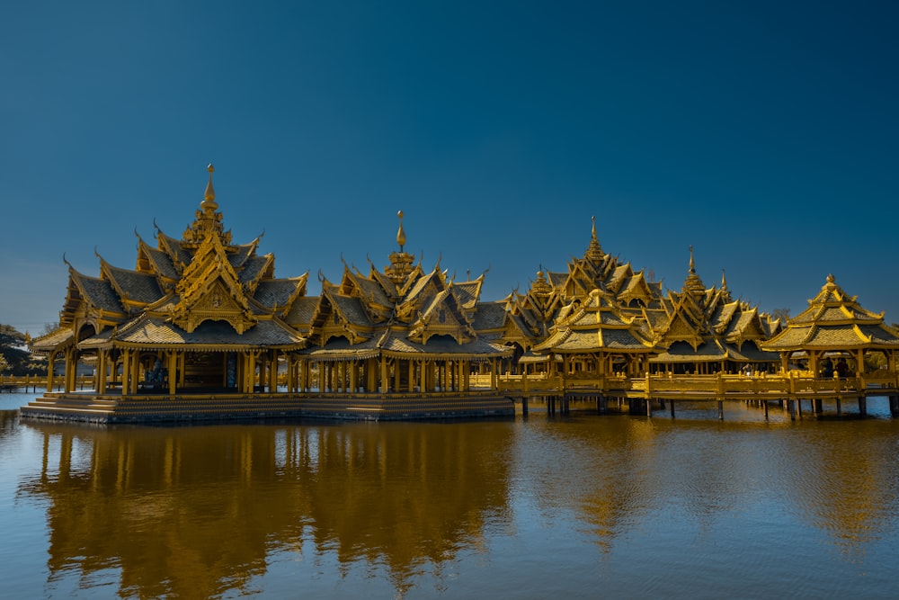 a large body of water with a building in the middle of it