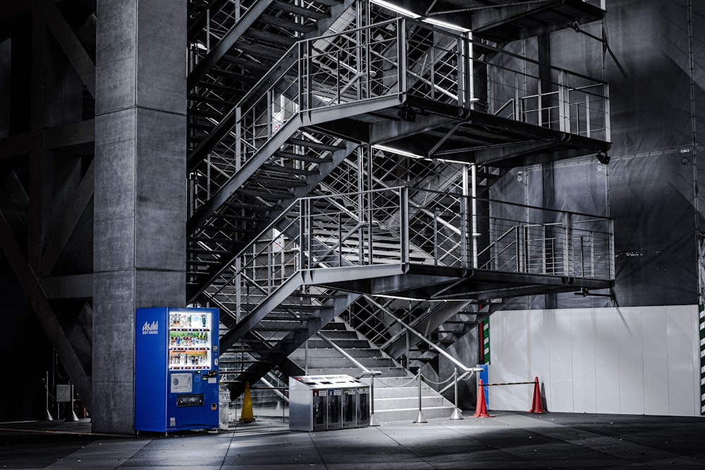 a fire escape next to a parking meter