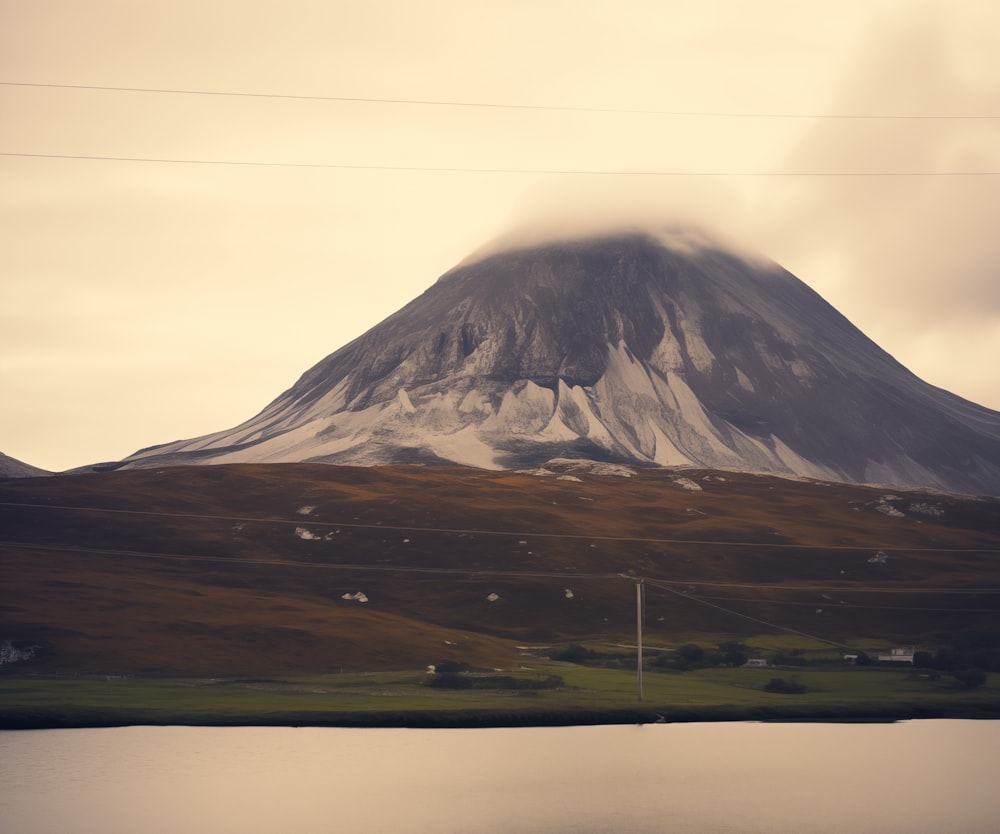 a mountain with a lake in front of it