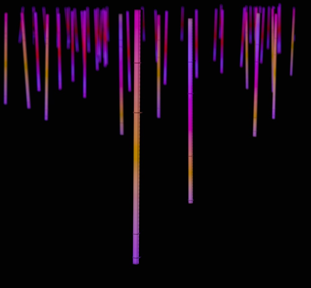 a number of different colored lines on a black background