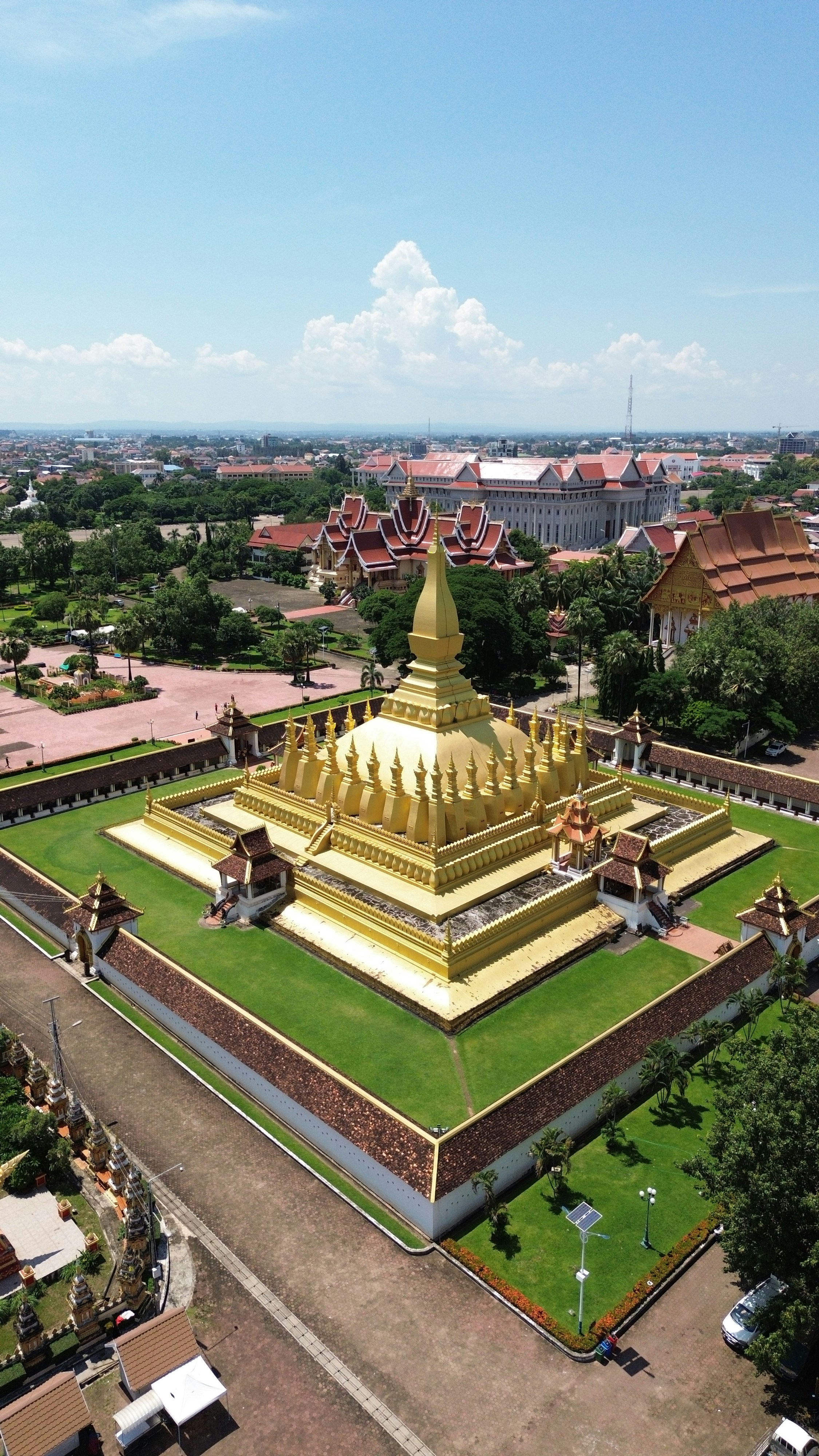 An aerial view of a large golden building photo – Free Building Image ...