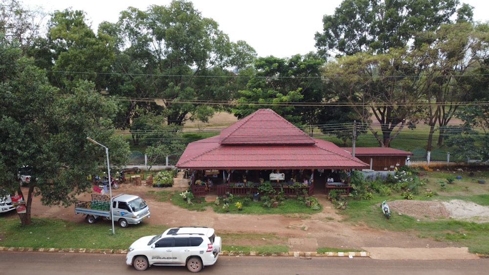 a white truck parked in front of a house