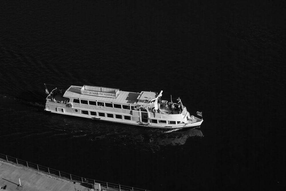 a large boat floating on top of a body of water