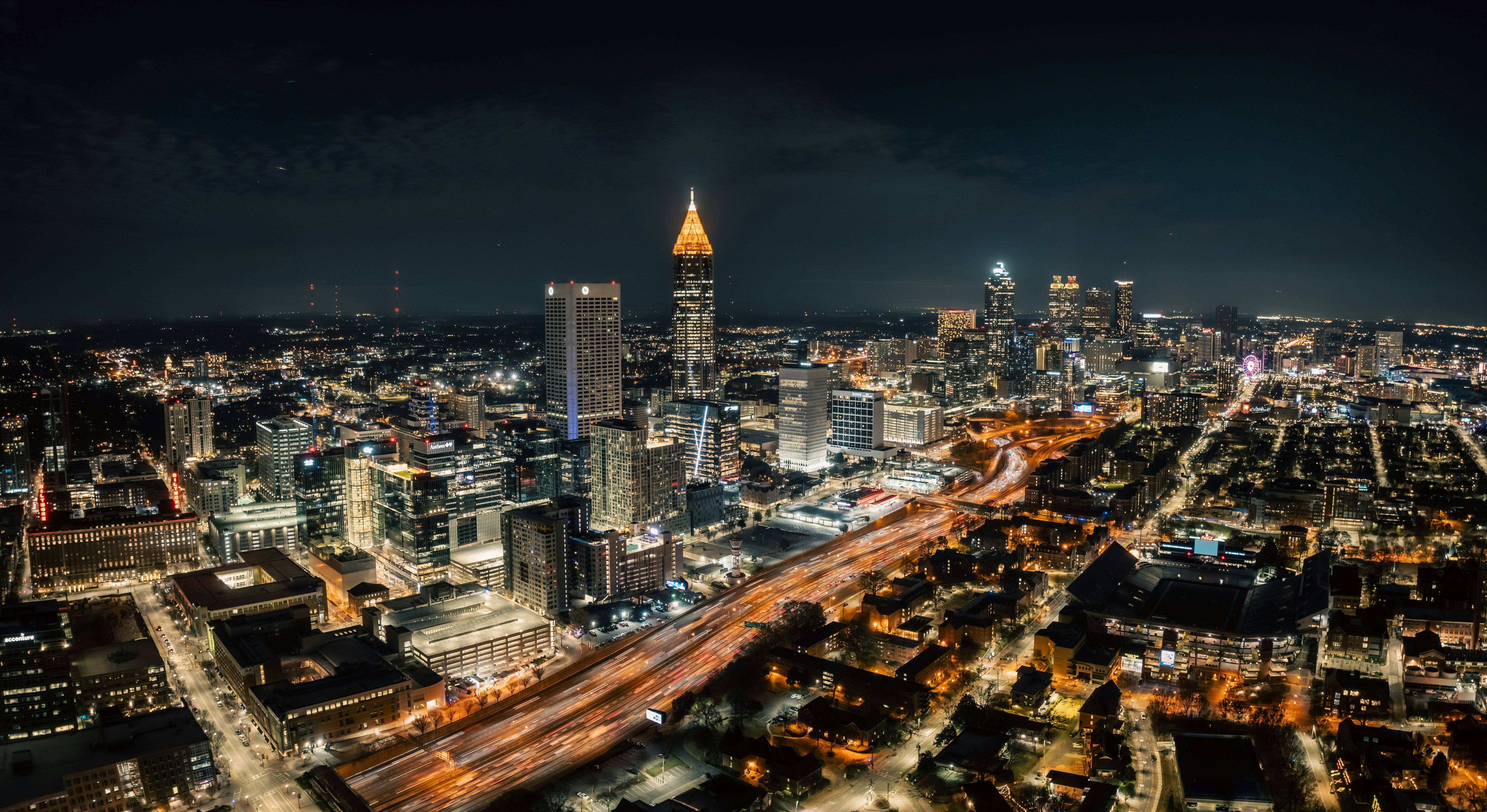 an aerial view of a city at night